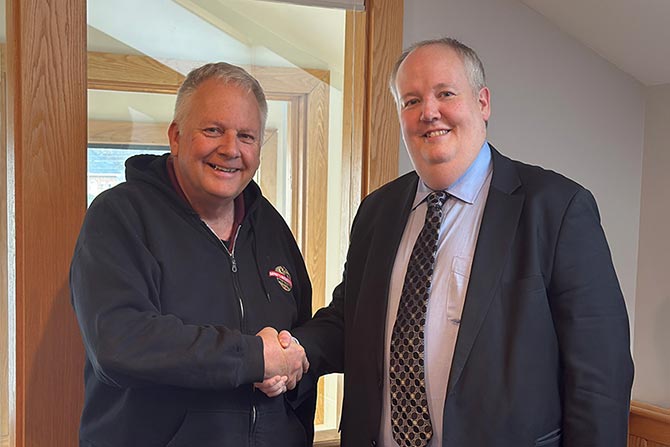 Bill Gurney and Jeffrey Burditt (Quirk Auto Dealers of NH), the new board chair of the Workers’ Compensation Trust